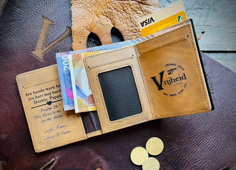 Personalised leather wallet with an engraved family message